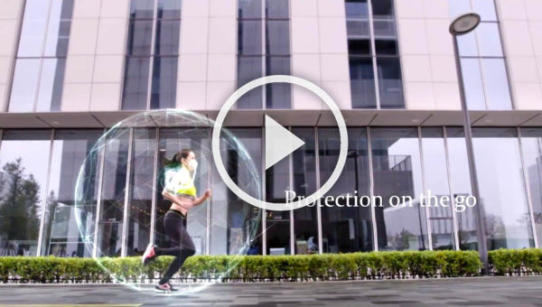 Woman jogging in giant bubble