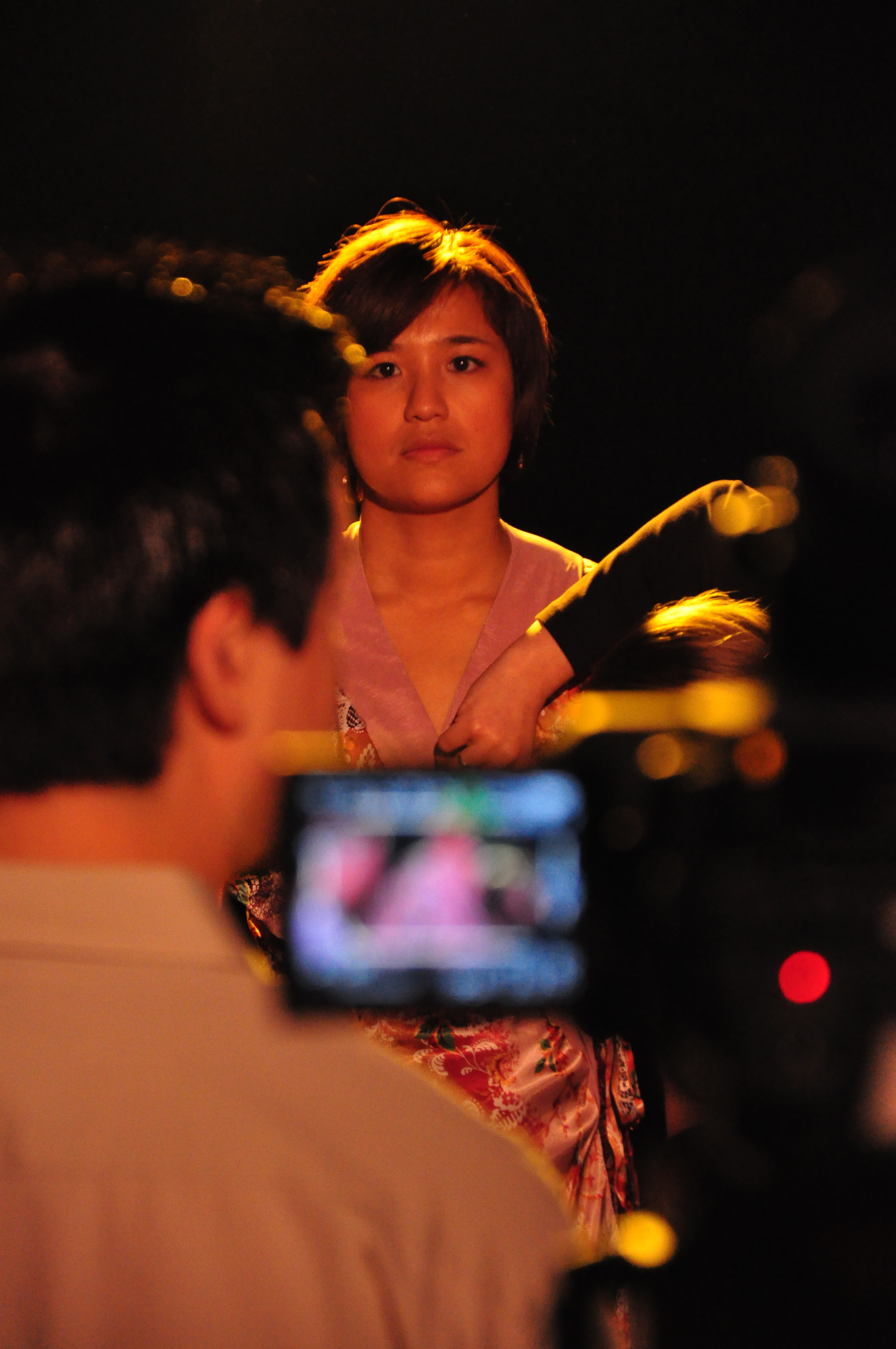 Asian actress in front of camera