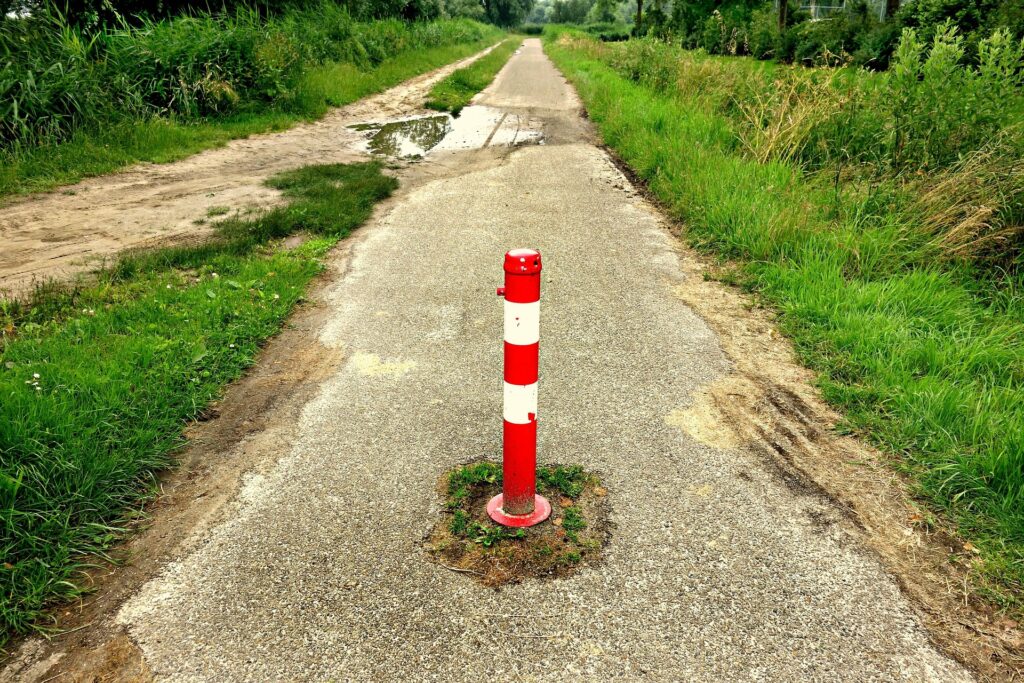 Obstacle post in the middle of the road